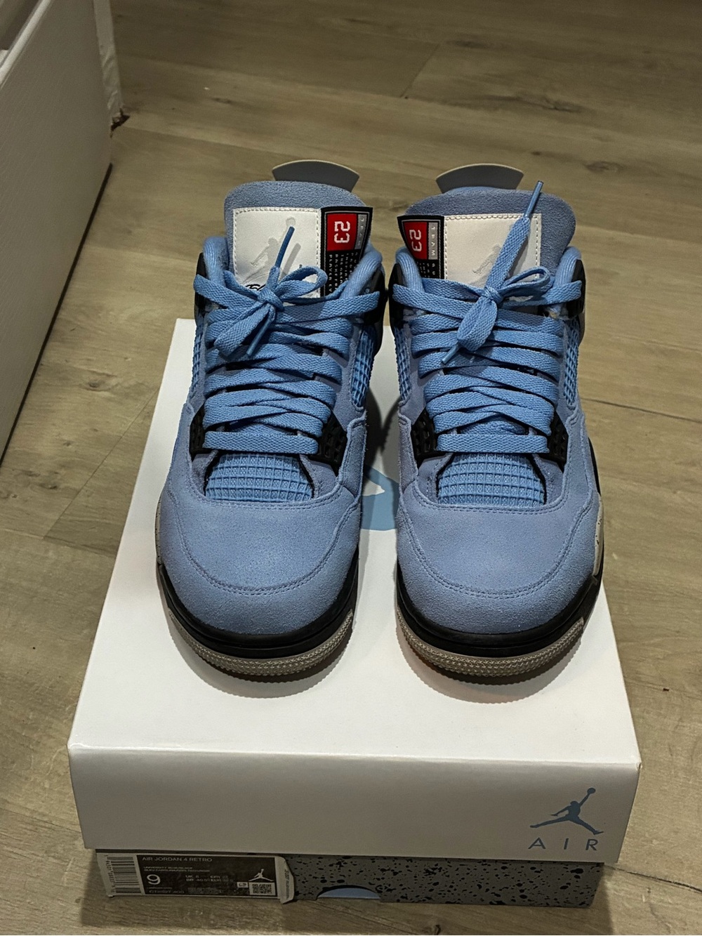Air Jordan 4 UNC Men’s Athletic Shoes - Light Blue and Black
